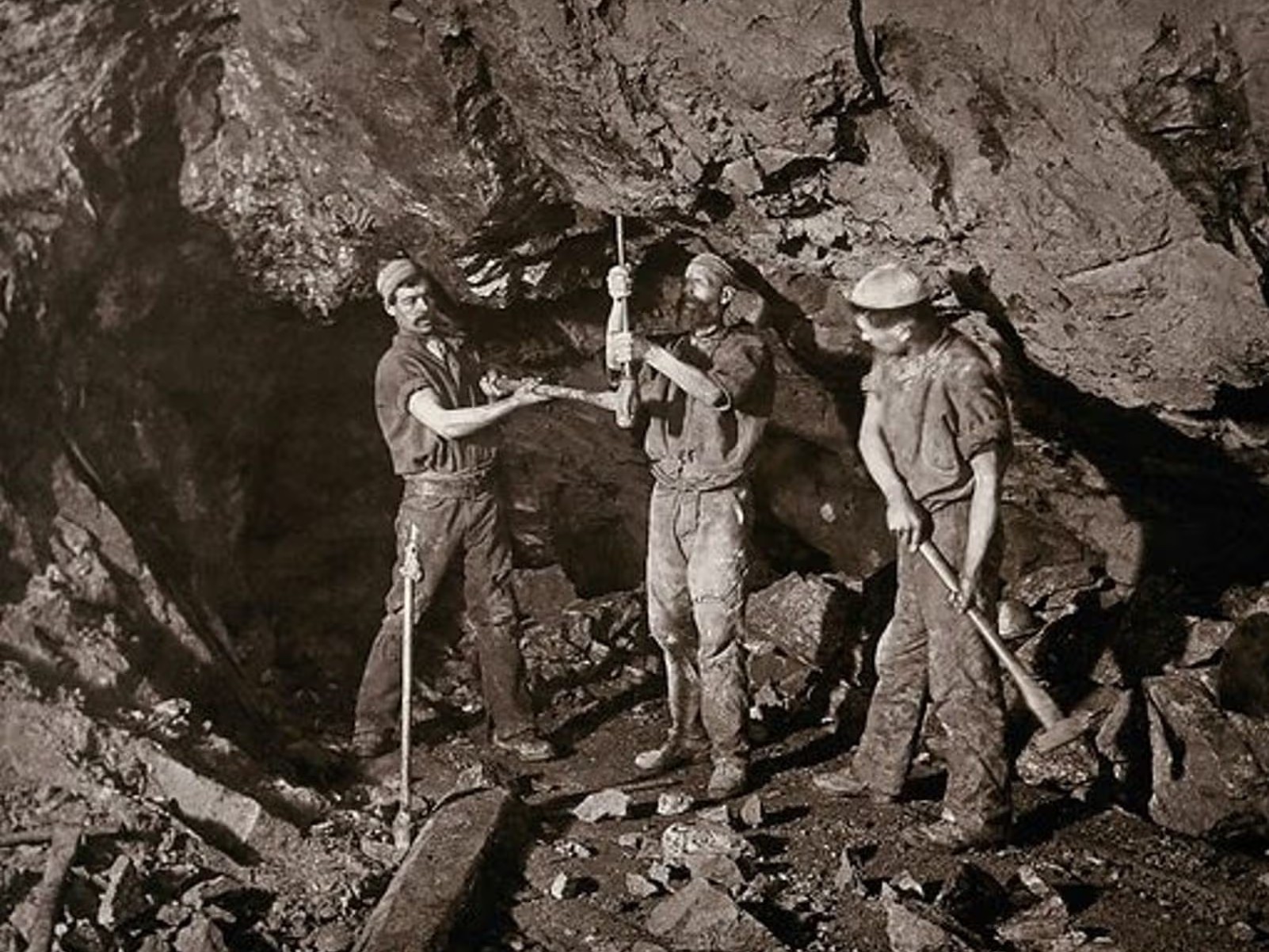 Three miners in a Camborne mineshaft